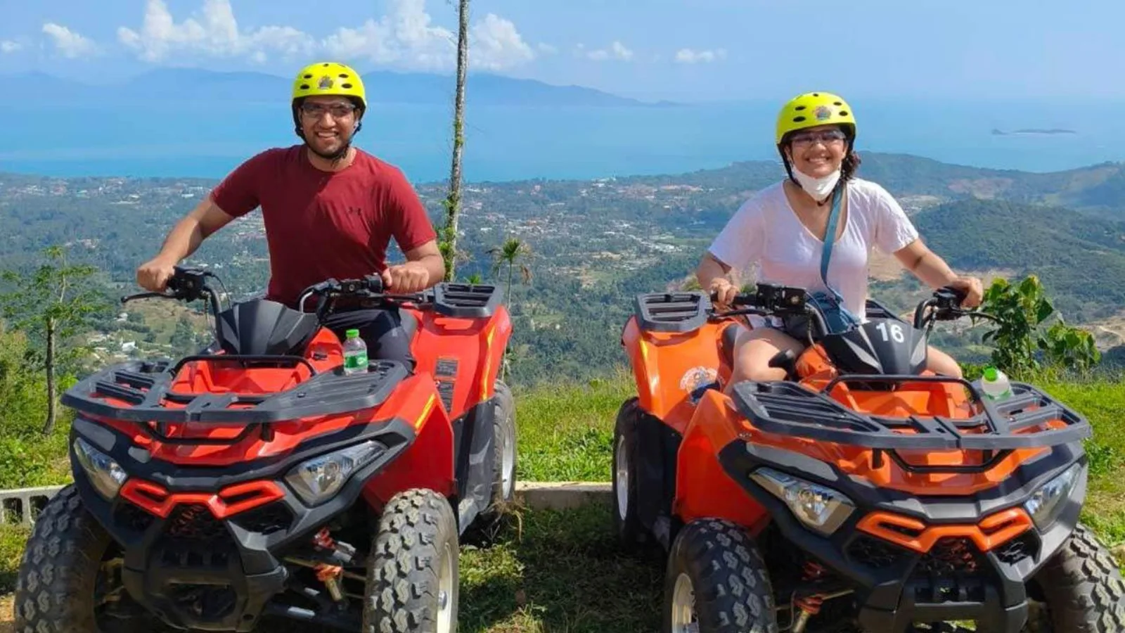 Guide leading a group of ATVs through coconut plantation on Koh Samui