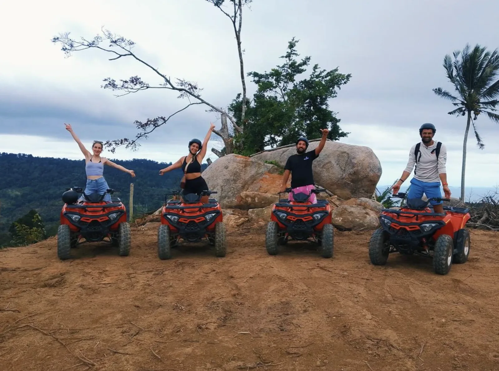 Rider and passenger sharing one quad bike on a Koh Samui jungle safari