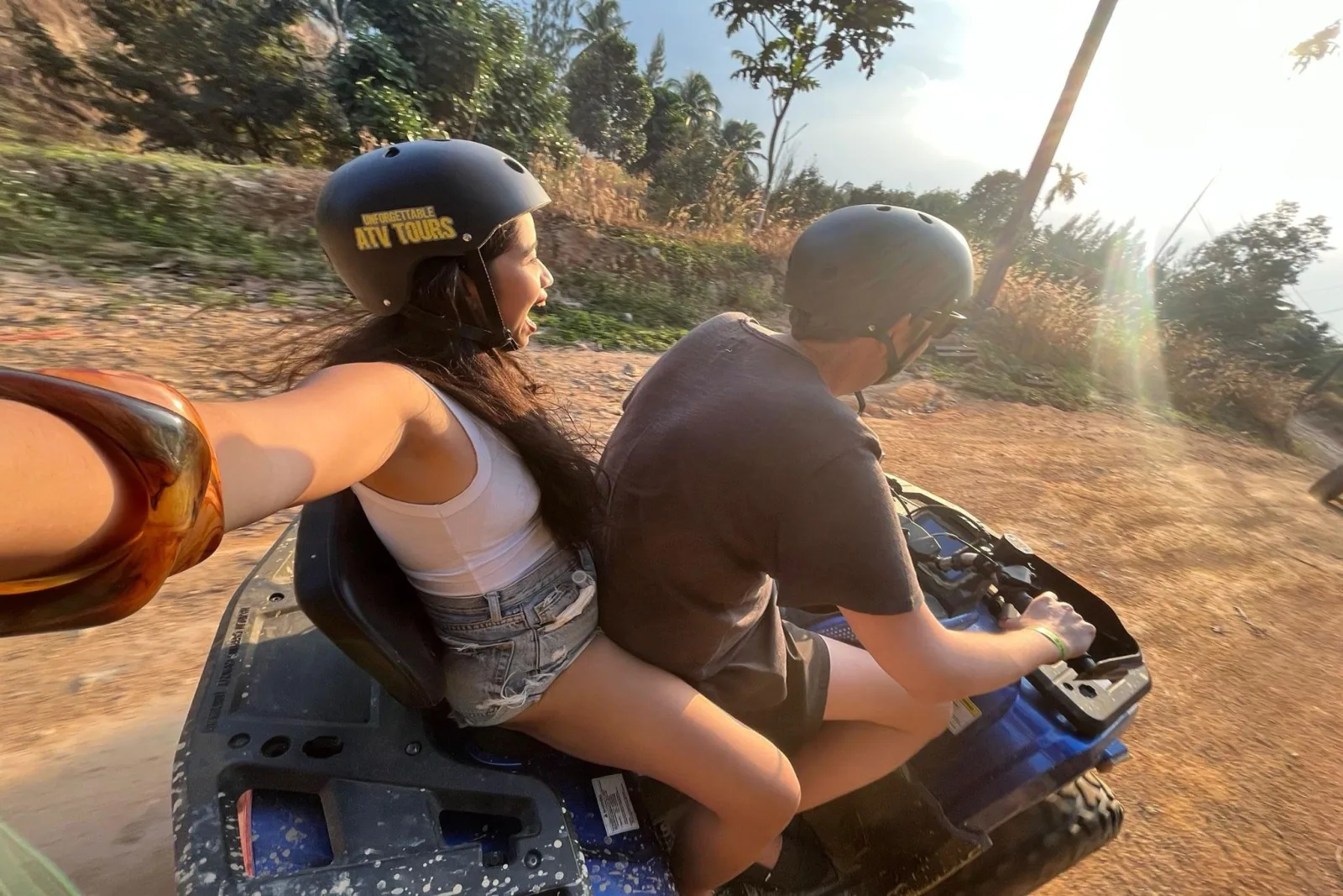 Jungle Quad guests giving a thumbs up on their ATVs on a Koh Samui trail