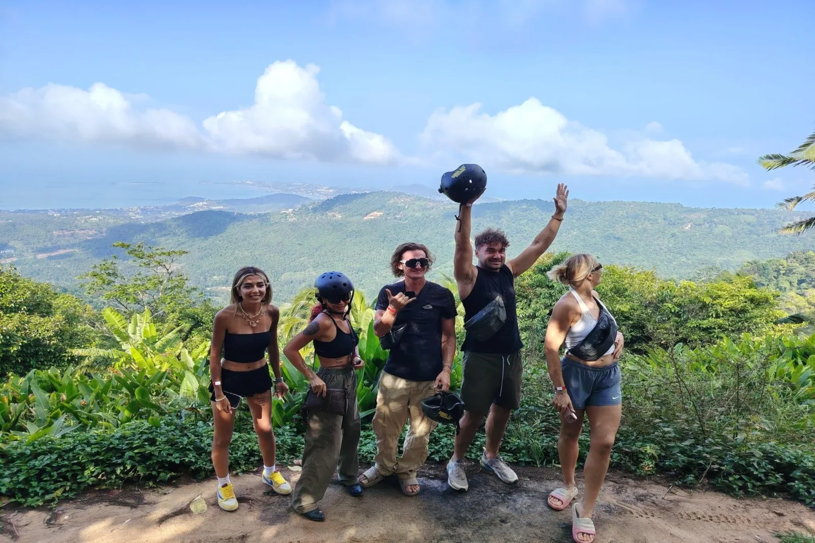 Guests at a mountain viewpoint over Koh Samui on the four-hour Ultimate ATV tour