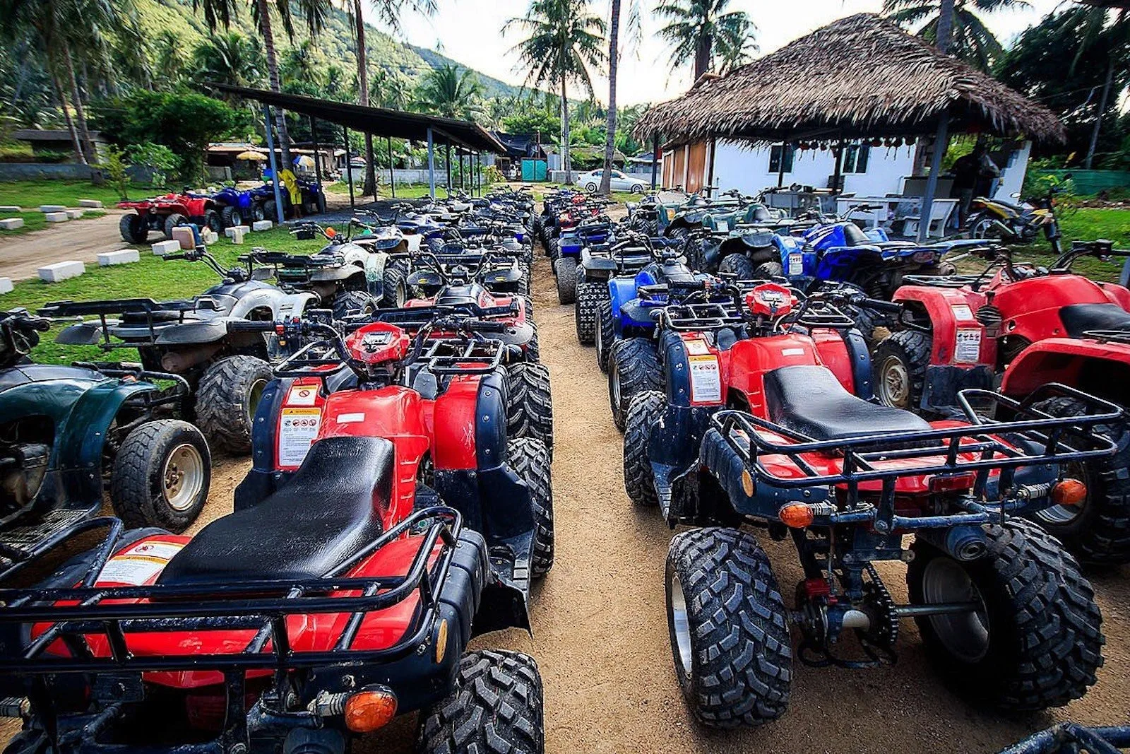 Panoramic viewpoint over Koh Samui's mountains and coastline from an ATV route