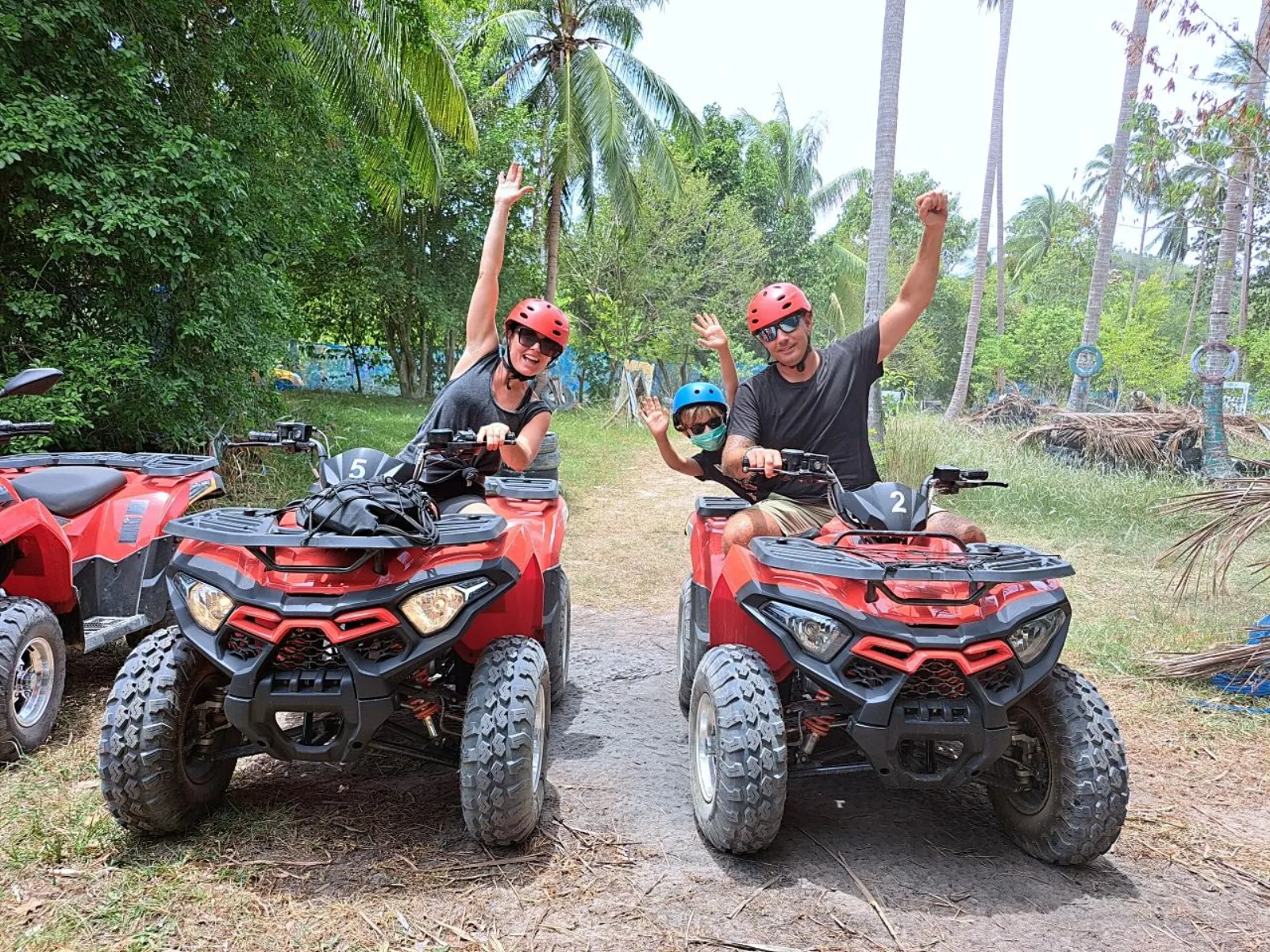 Lexi Adventures rider splashing through a river crossing on a Koh Samui ATV tour