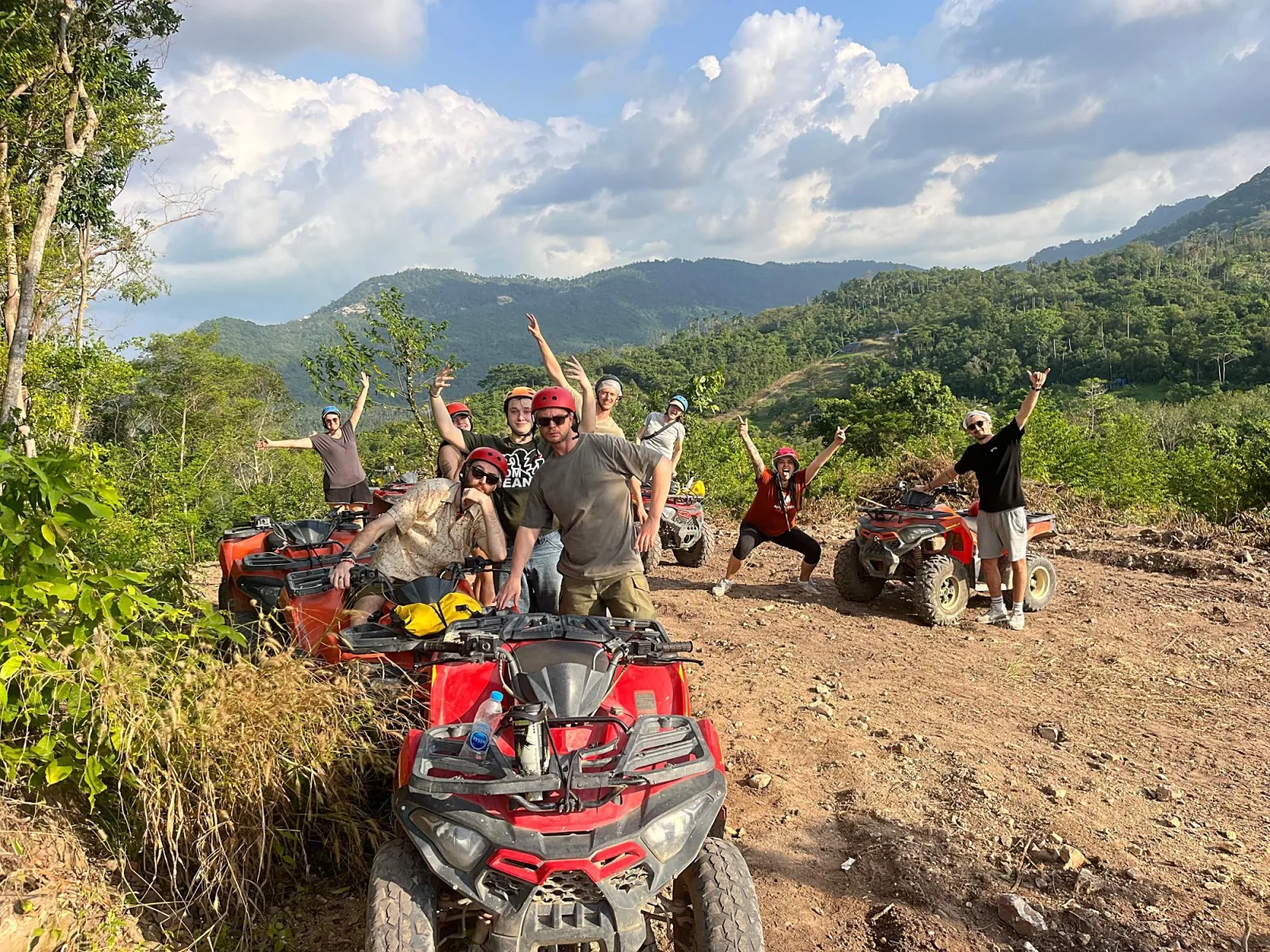 Instructor briefing riders on an automatic quad bike before a Koh Samui trail